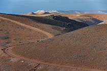 rocky track through arid hills