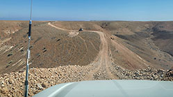 ranger-camper & disco driving down steep hill