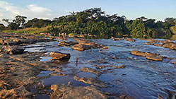 river on top of waterfall