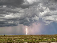 lightning & stormy clouds over plain