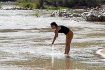 Roberta refreshing in Kunene river