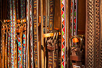 leather belts with beadles in craft shop