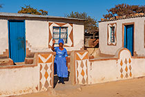 woman (Sophia Makau) near pedi home