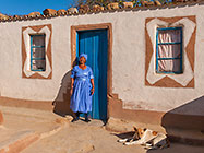 woman (Sophia Makau) near pedi home