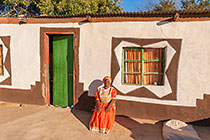 old woman (Miriam Moabi) near pedi home