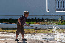 James playing with water